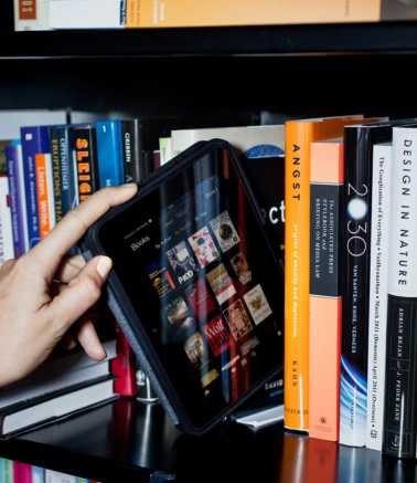 Best Book Writing & Publishing Services in Hyderabad The books were stacked one after another on the rack, & there was also a tablet for publishing books