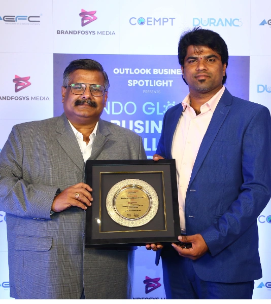 Best Public Relations Agency in Coimbatore,Tamil Nadu An industry expert is receiving awards in an award ceremony that highlights brand achievements.