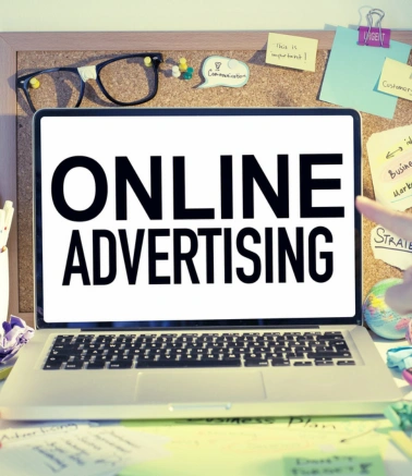 Top Brand Promotion & Online Advertising Services in Hyderabad A laptop displays online advertising strategies for business development and brand promotion.
