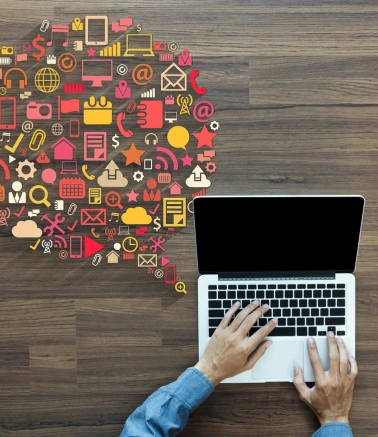 Top Digital Content Development Services in Hyderabad A person working on his laptop to create & develop content makes use of various digital technologies